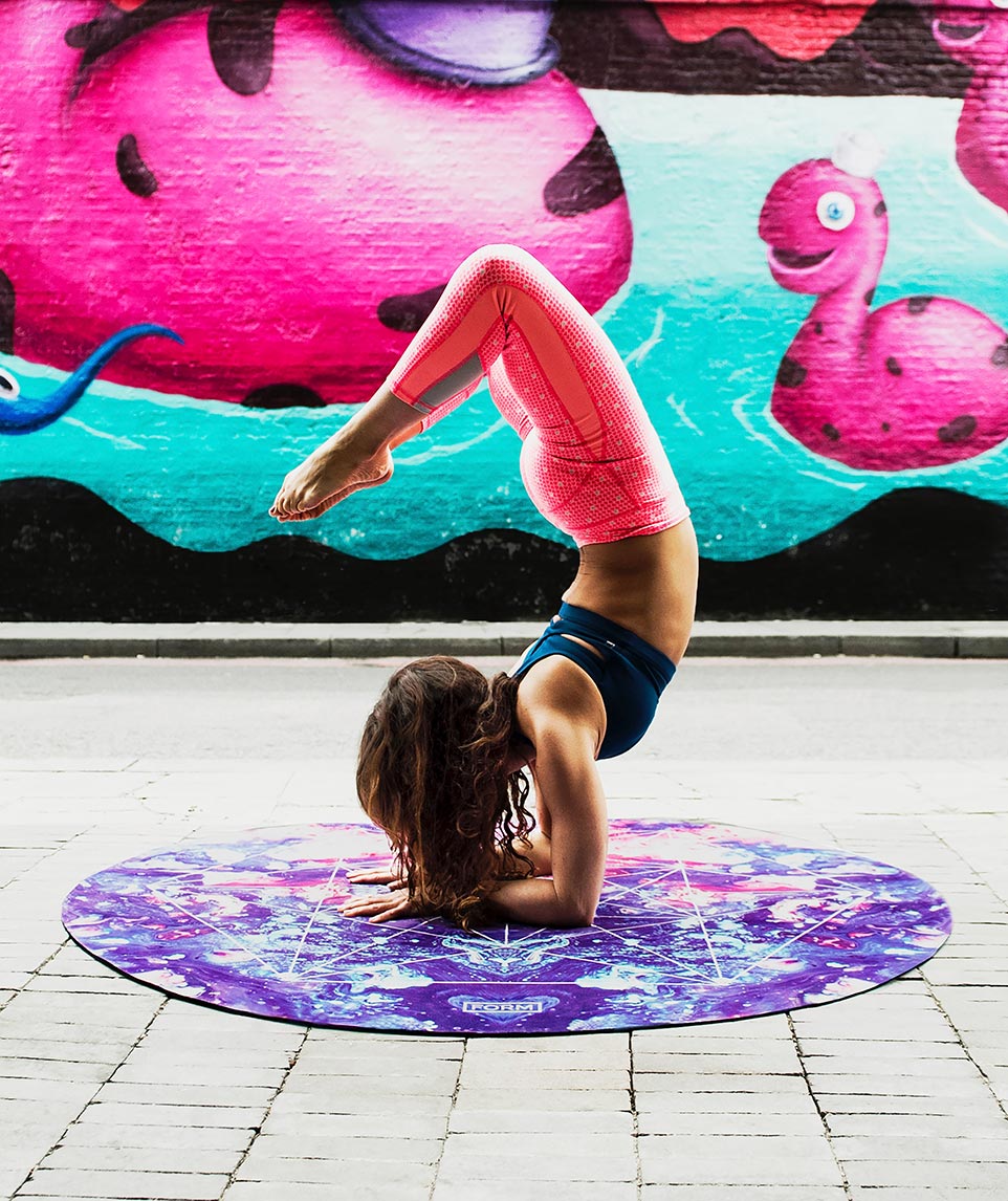 Girl in yoga position outside